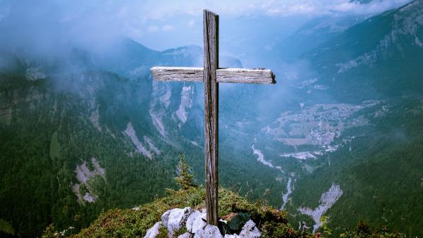 a cross on a hill