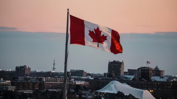 a canadian flag flying