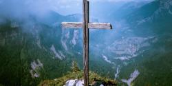 a cross on a hill