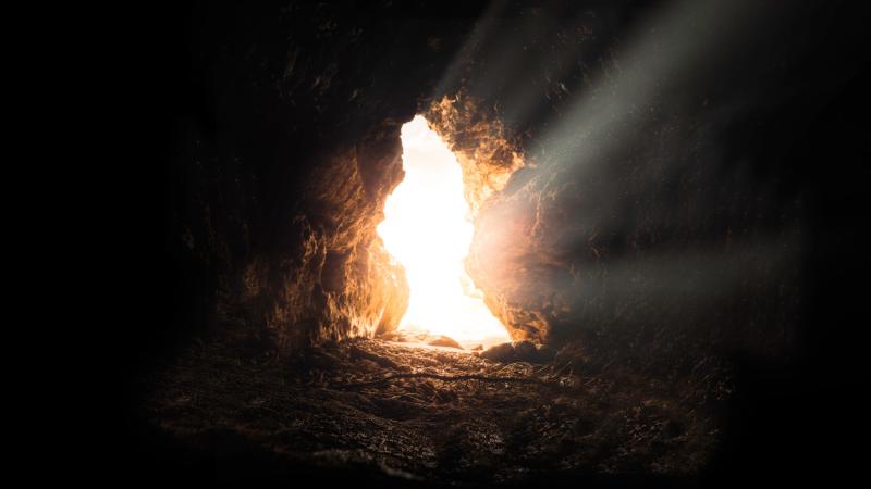 light streams into a cave