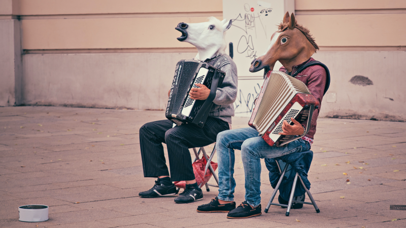 scientifically perfect comedy (two men in horse masks)