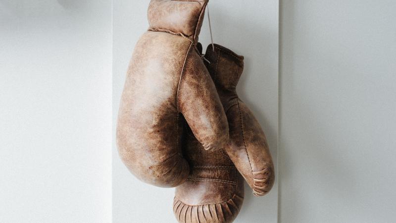 Boxing gloves hung up.