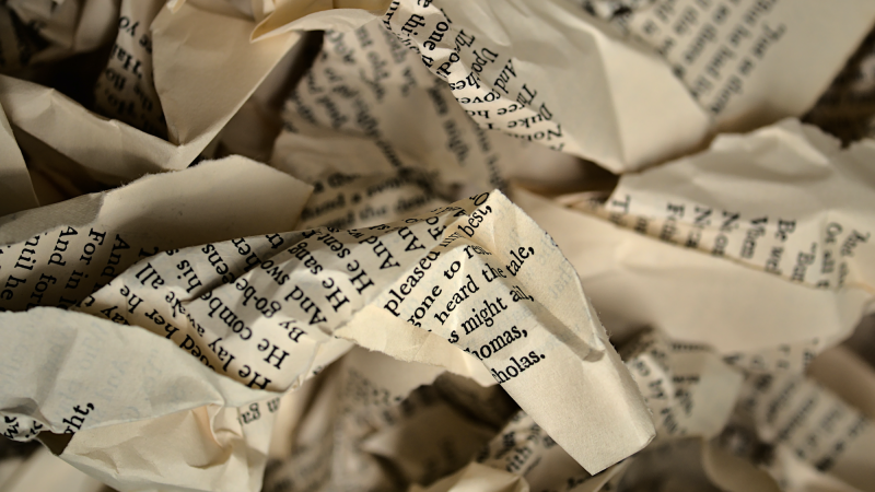 crumpled pages from a book